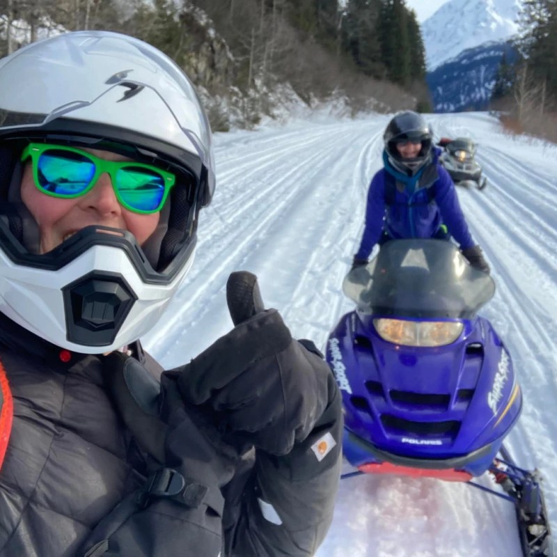 a group of people that are standing in the snow