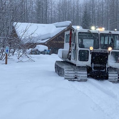 a large truck covered in snow
