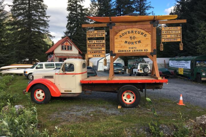 a truck is parked in the grass