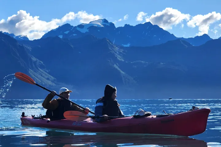 a boat sitting on top of a mountain