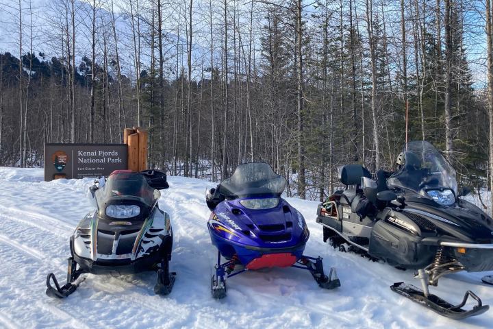 a snowmobile parked in the snow