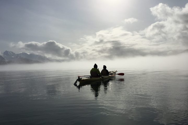 a small boat in a body of water