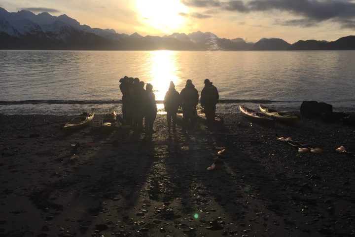 a sunset over a body of water