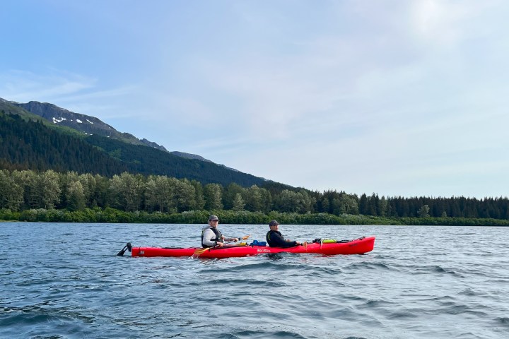 a small boat in a large body of water