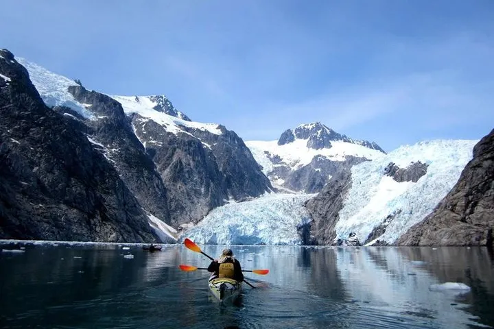 a man water skiing on a mountain