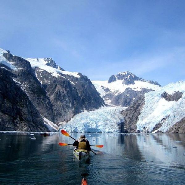 a man water skiing on a mountain