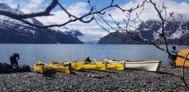 a boat sitting on top of a mountain