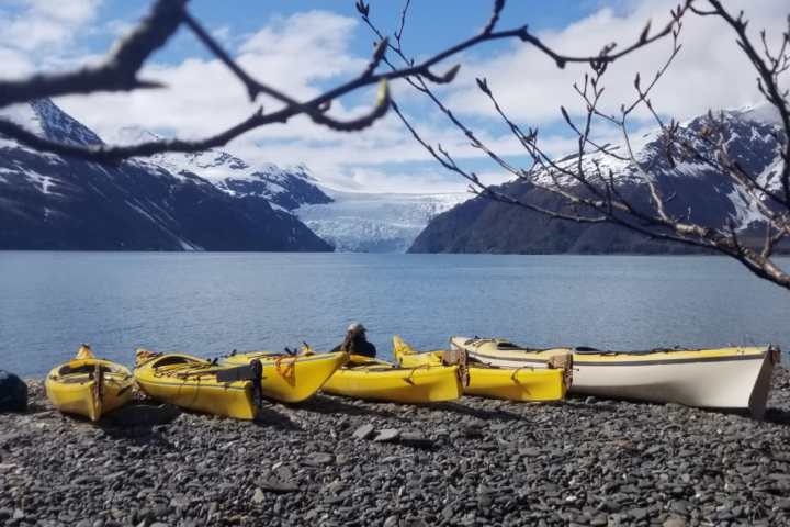 a boat sitting on top of a mountain