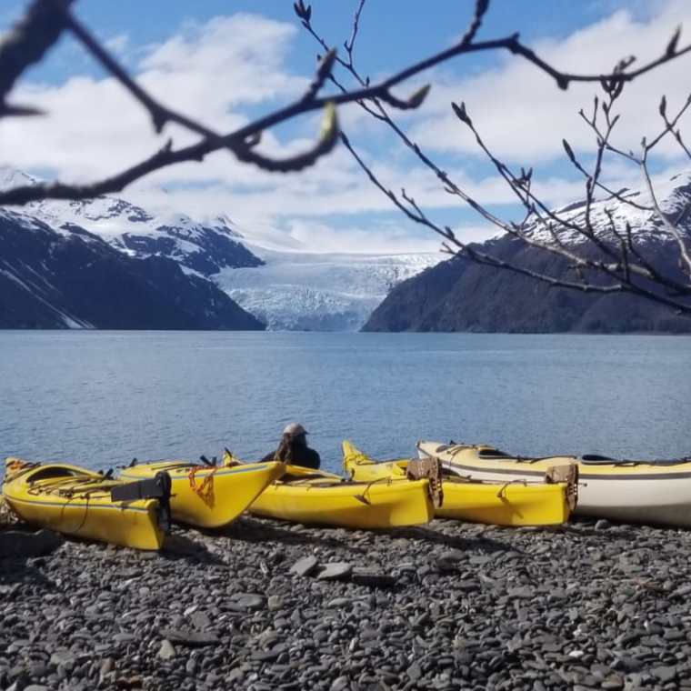 a boat sitting on top of a mountain