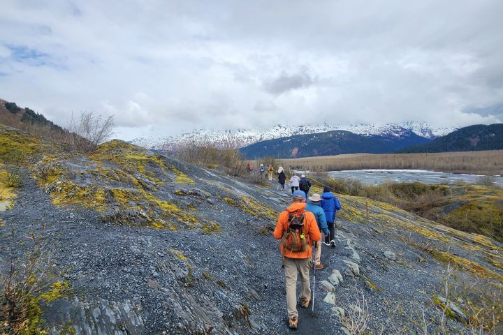 a man walking up a hill