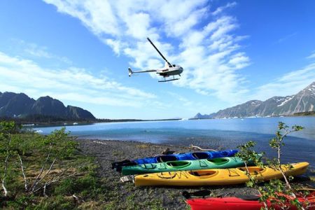 a plane flying over a body of water