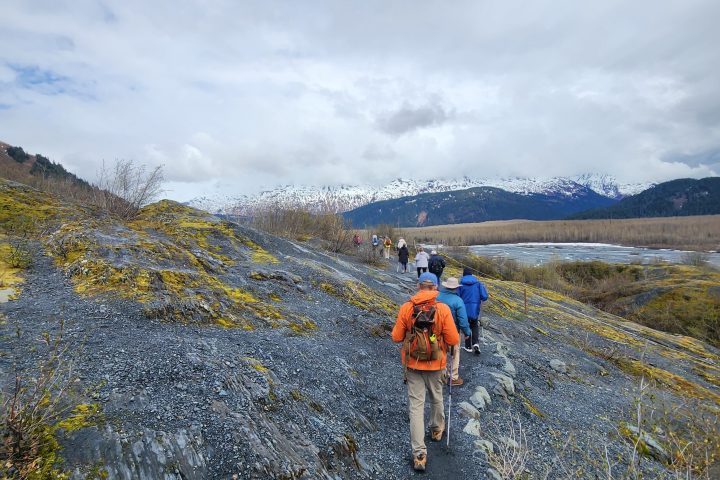 a man walking up a hill